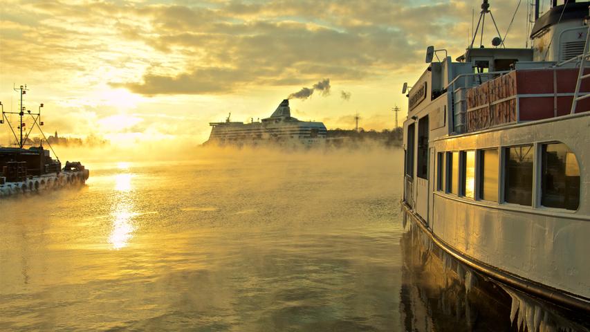Mein schönster Urlaub unter freiem Himmel war in Finnland, Helsinki. Ich war mit meiner Freundin um 7 Uhr früh am Hafen, als gerade die Sonne am Horizont aufstieg. Auch wenn es -30 Grad Celsius hatte, musste ich dieses Bild schießen.