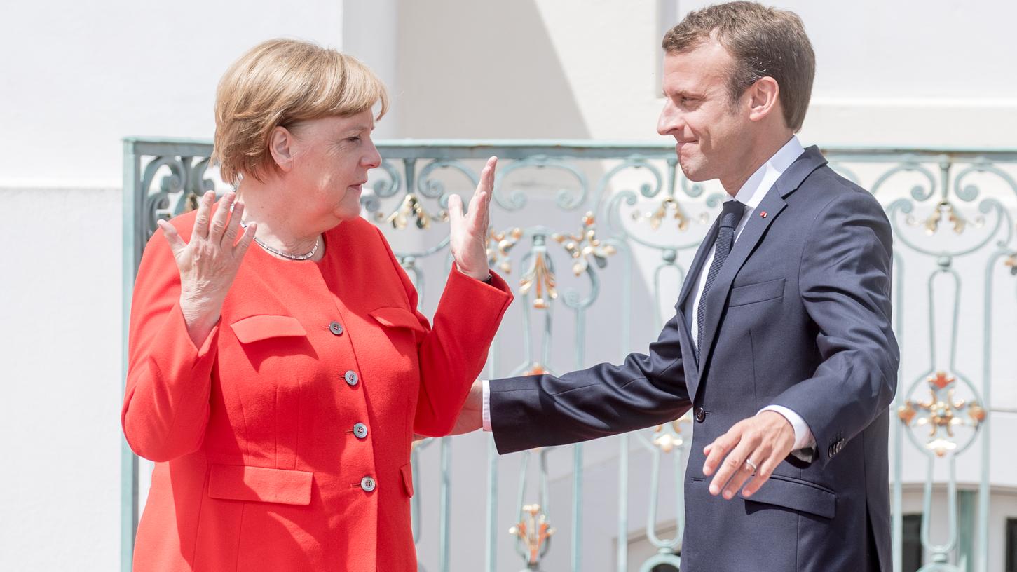 Macron unterstützt Merkel im Asylstreit mit der CSU