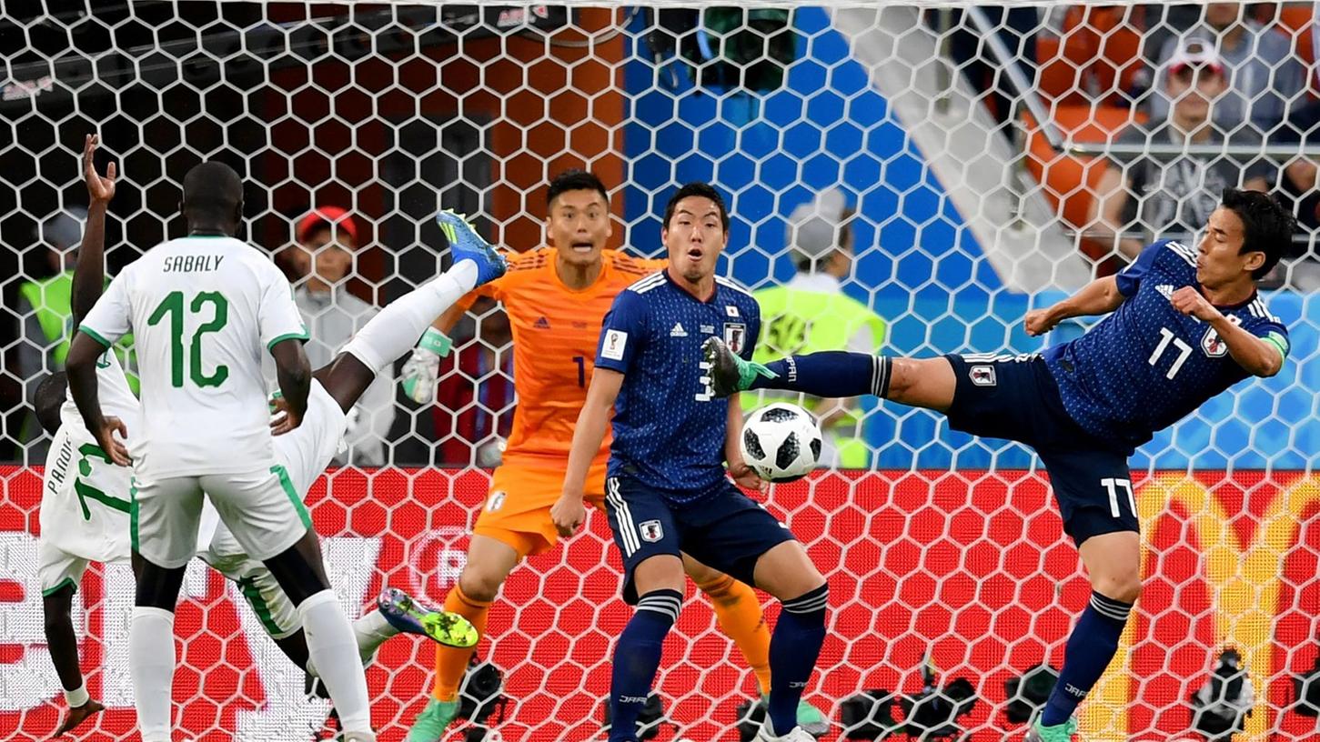 Hoch die Beine: Zwischen Japan und dem Senegal gab es keinen Sieger.