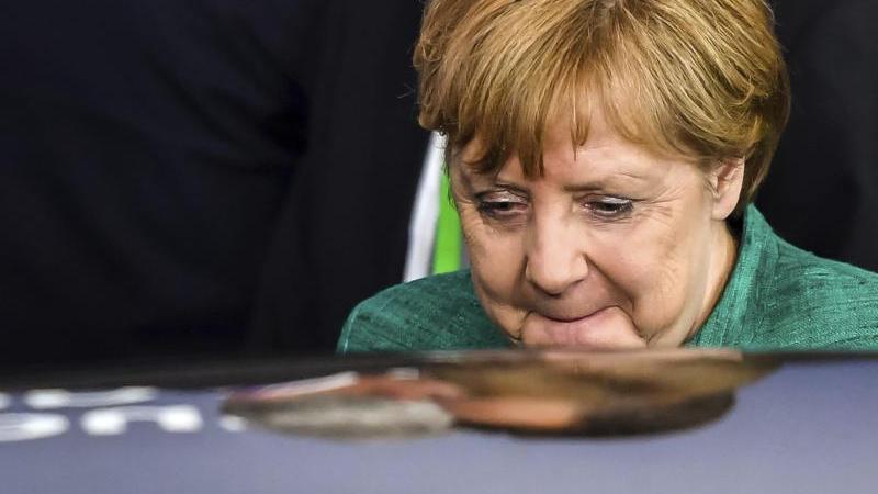 Ist zufrieden: Insgesamt nannte CDU-Chefin Merkel die Einigung auf einen gemeinsamen Text der 28 Staats- und Regierungschefs eine "gute Botschaft".