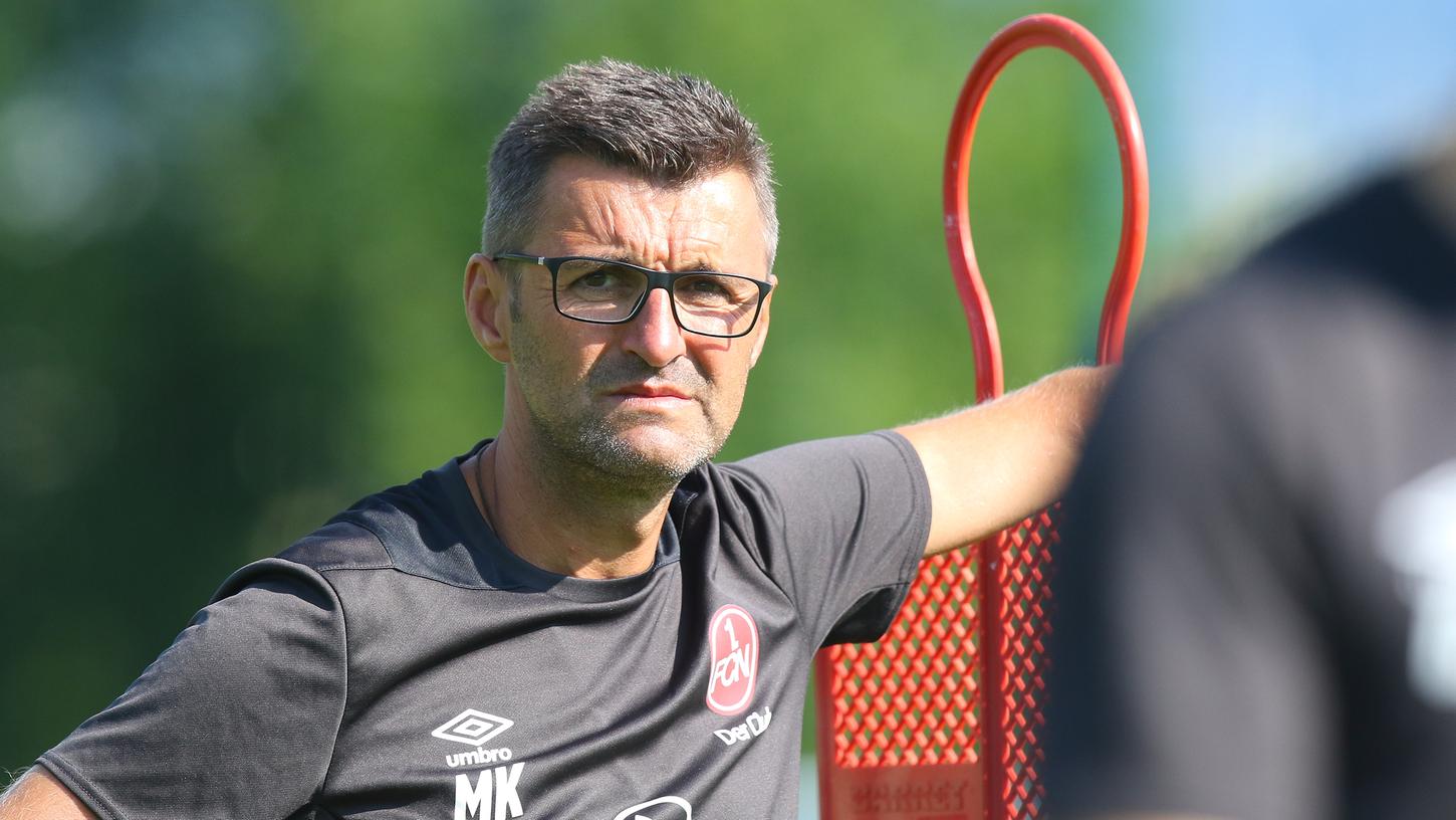 Club-Coach Michael Köllner glaubt fest daran, dass der 1. FC Nürnberg in der vergangenen Saison göttlichen Beistand erhalten hat.