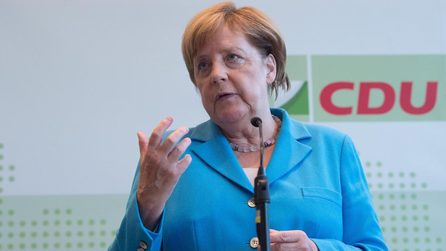 Merkel kündigt mehr Engagement für Abschiebungen an