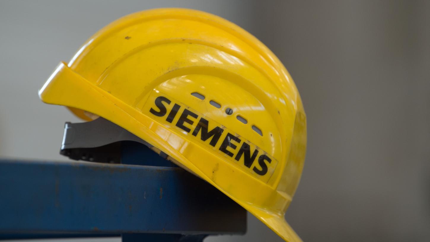 Wegen einer möglichen Lieferung für ein umstrittenes Kohleprojekt steht Siemens derzeit in der Kritik australischer Umweltschützer.