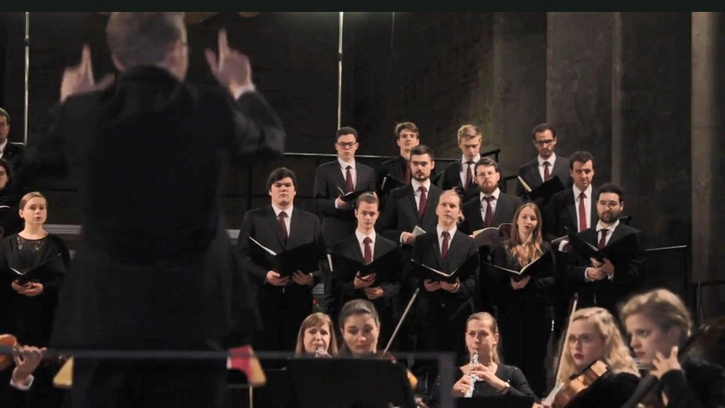 Stimmen voller Präzision: Justus Merkel leitet ein A-cappella-Ensemble