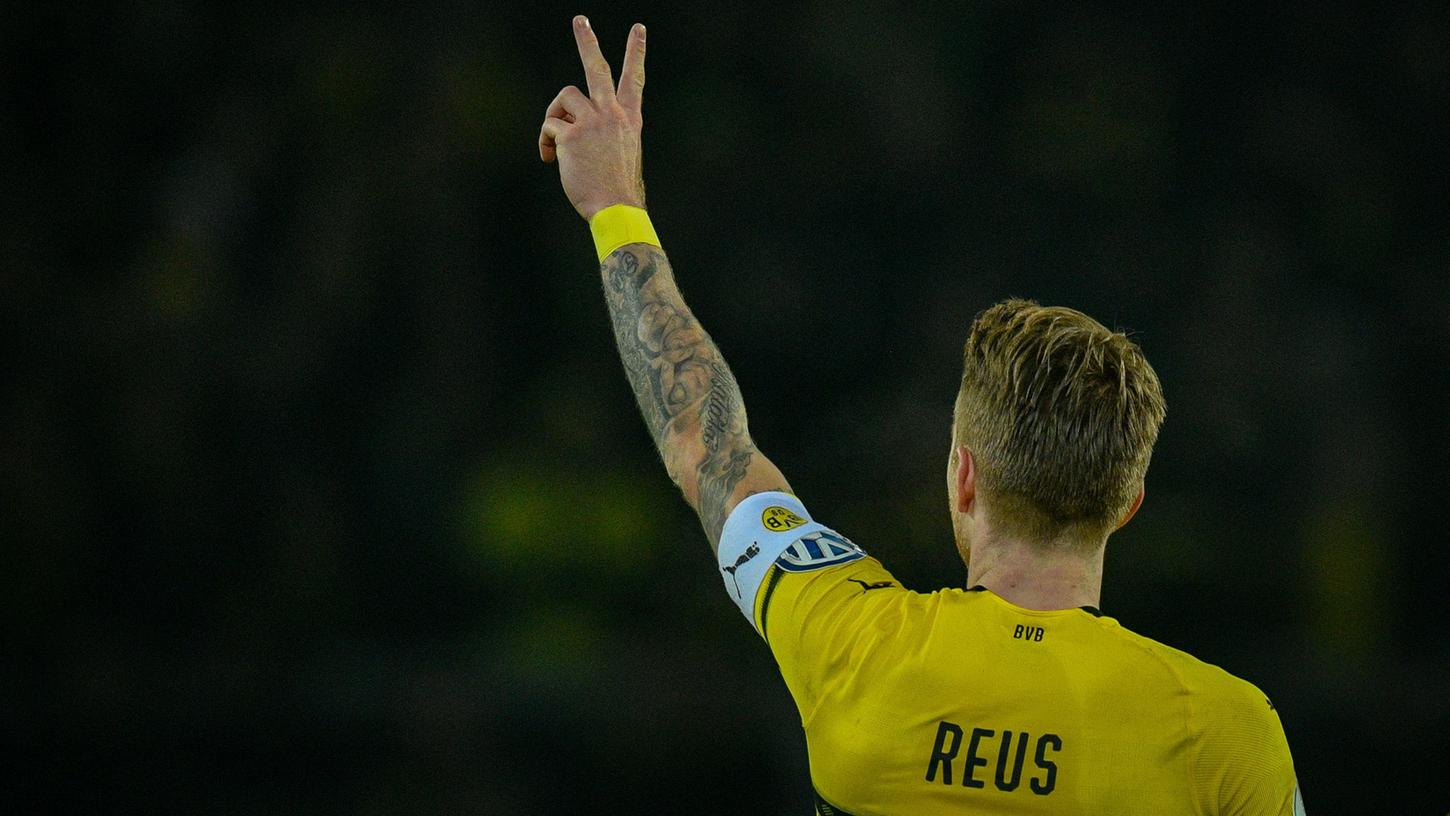 Dortmunds Kapitän Marco Reus kann seinem Team bei Tottenham Hotspur nur die Daumen drücken.