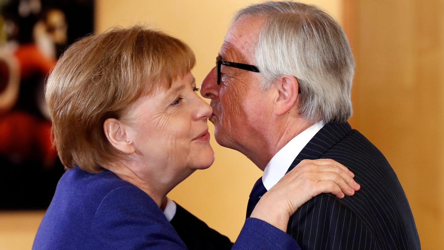 Kennen sich seit Jahren - und pflegen eine gewissen Sympathie: Angela Merkel und Jean-Claude Juncker.