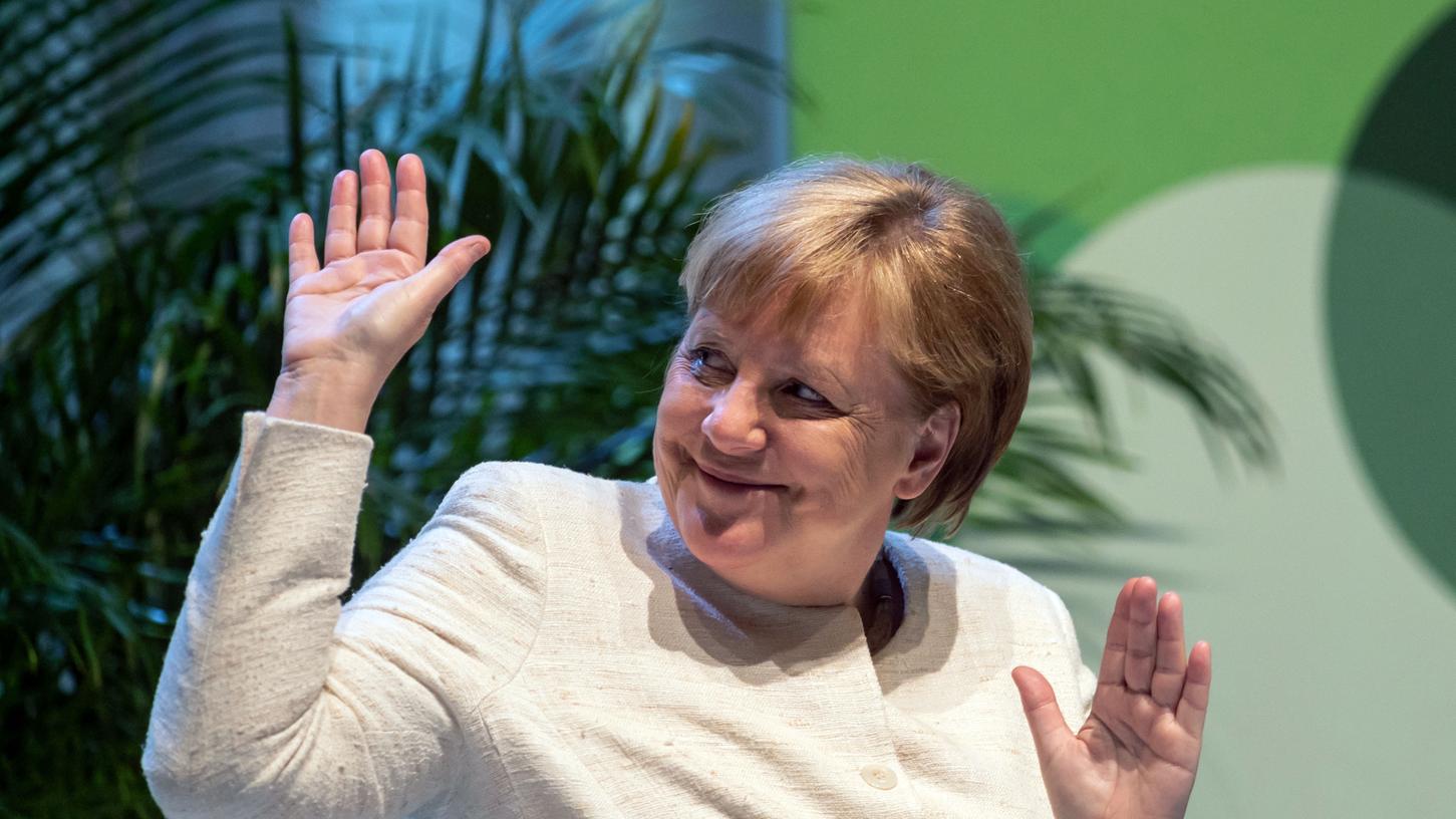 Kanzlerin Angela Merkel (hier beim evangelischen Kirchentag) erwartet am Montagabend Größe der Autoindustrie im Kanzleramt.