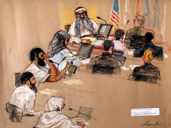 Die Gerichtszeichnung zeigt die die mutmaßlichen Hauptdrahtzieher der Terroranschläge: 2001 Chalid Scheich Mohammed, Walid Bin Attasch, Ramzi Binalshibh, Ali Abdel Asis Ali und Mustafa Ahmed Al-Hausawi. Die Gerichtszeichnung zeigt die die mutmaßlichen Hauptdrahtzieher der Terroranschläge: 2001 Chalid Scheich Mohammed, Walid Bin Attasch, Ramzi Binalshibh, Ali Abdel Asis Ali und Mustafa Ahmed Al-Hausawi.