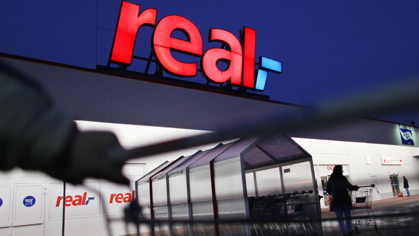 Metro-Chef Olaf Koch rechnet nicht mit Wegfall von 10.000 Stellen bei der Supermarktkette Real.
