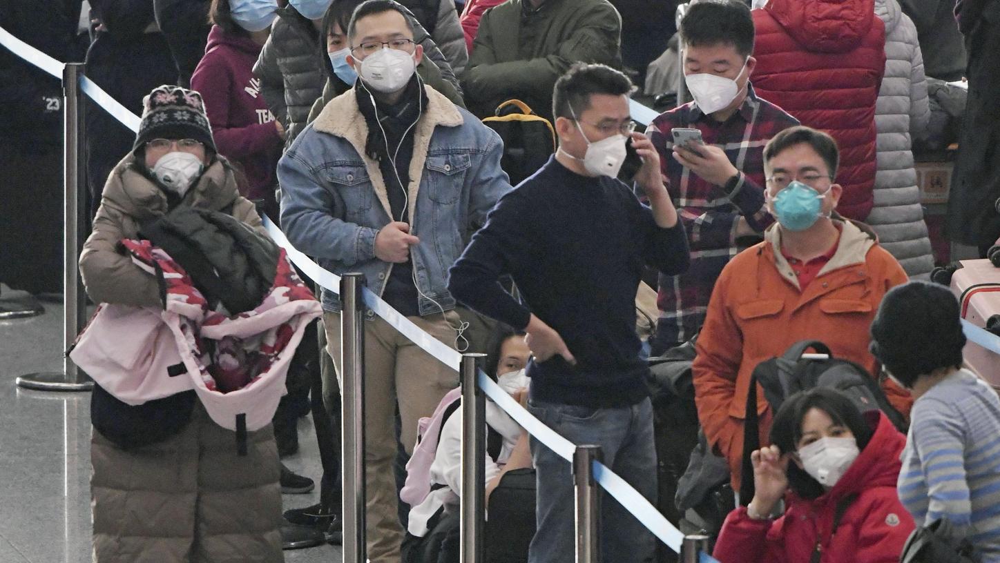 China hat eine Sperre für öffentliche Verkehrsmittel und Flughäfen in verschiedenen Städten eingeführt, um die Ausbreitung des Corona-Virus zu verlangsamen.